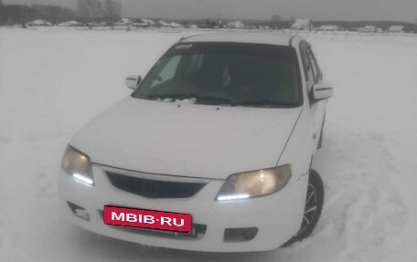 Mazda Familia, 2002 год, 310 000 рублей, 9 фотография