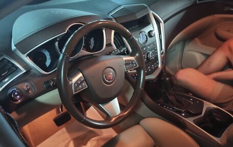 Cadillac SRX II рестайлинг, 2011 год, 1 400 000 рублей, 1 фотография