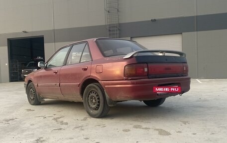 Mazda Familia, 1993 год, 200 000 рублей, 11 фотография