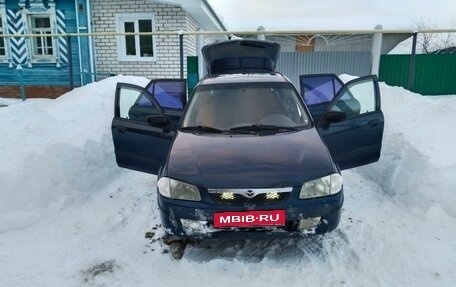 Mazda 323, 1999 год, 260 000 рублей, 5 фотография