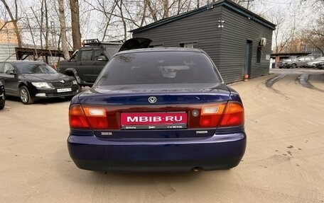 Mazda 323, 1996 год, 250 000 рублей, 5 фотография
