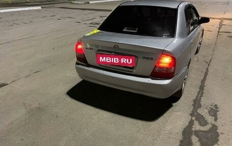 Mazda 323, 2002 год, 310 000 рублей, 3 фотография
