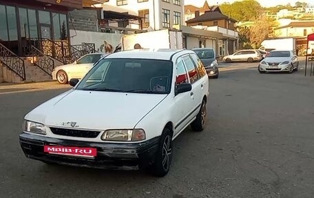 Mazda Familia Y10, 1998 год, 320 000 рублей, 4 фотография