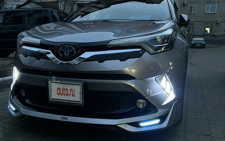 Toyota C-HR I рестайлинг, 2018 год, 2 100 000 рублей, 36 фотография