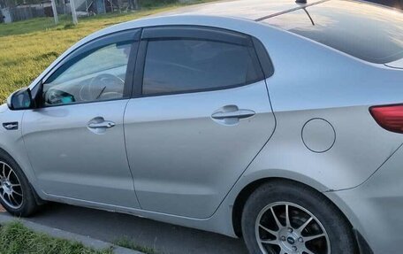 KIA Rio III рестайлинг, 2012 год, 700 000 рублей, 5 фотография