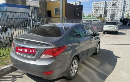 Hyundai Solaris II рестайлинг, 2011 год, 900 000 рублей, 3 фотография