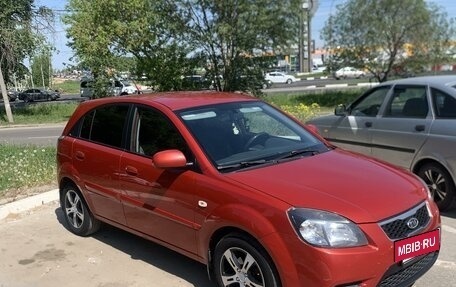 KIA Rio II, 2011 год, 670 000 рублей, 3 фотография