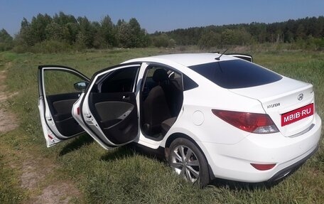 Hyundai Solaris II рестайлинг, 2011 год, 799 000 рублей, 11 фотография