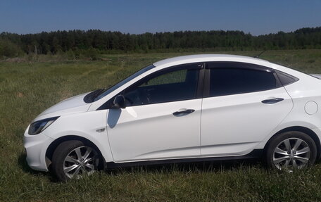 Hyundai Solaris II рестайлинг, 2011 год, 799 000 рублей, 17 фотография