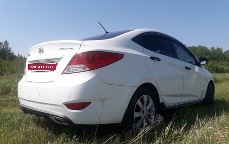 Hyundai Solaris II рестайлинг, 2011 год, 799 000 рублей, 16 фотография