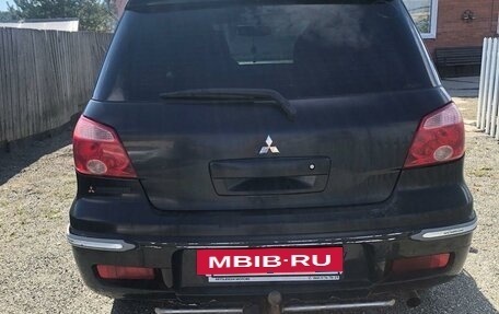 Mitsubishi Outlander III рестайлинг 3, 2007 год, 730 000 рублей, 4 фотография