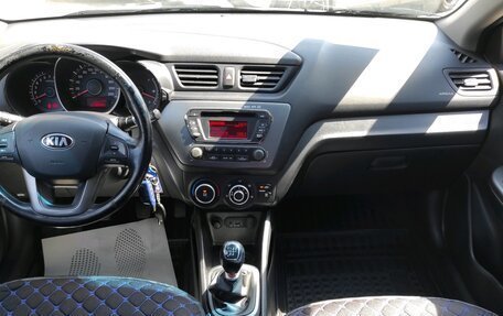 KIA Rio III рестайлинг, 2014 год, 1 035 000 рублей, 21 фотография