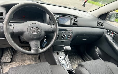 Toyota Corolla, 2004 год, 595 000 рублей, 9 фотография