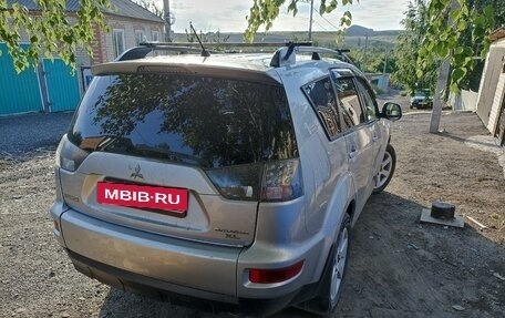 Mitsubishi Outlander III рестайлинг 3, 2010 год, 910 000 рублей, 3 фотография