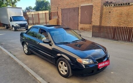 Mazda Protege, 2001 год, 450 000 рублей, 6 фотография