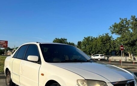 Mazda Familia, 2001 год, 265 000 рублей, 1 фотография