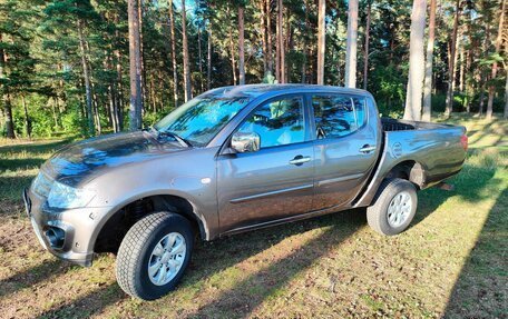 Mitsubishi L200 IV рестайлинг, 2013 год, 1 650 000 рублей, 5 фотография