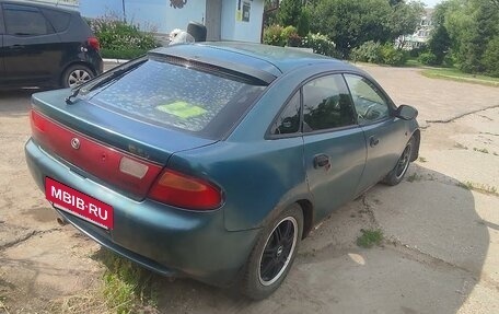 Mazda 323, 1997 год, 110 000 рублей, 3 фотография