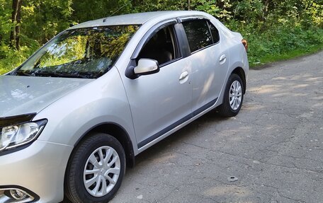 Renault Logan II, 2017 год, 870 000 рублей, 13 фотография