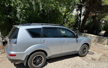 Mitsubishi Outlander III рестайлинг 3, 2011 год, 1 550 000 рублей, 3 фотография