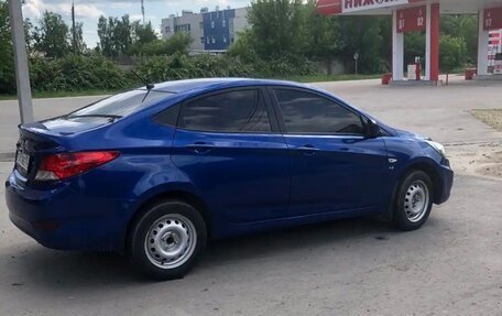 Hyundai Solaris II рестайлинг, 2011 год, 650 000 рублей, 4 фотография