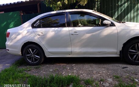 Volkswagen Jetta VI, 2013 год, 800 000 рублей, 3 фотография