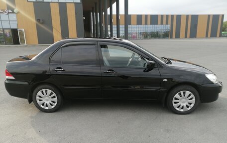 Mitsubishi Lancer IX, 2009 год, 555 000 рублей, 2 фотография