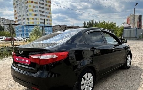 KIA Rio III рестайлинг, 2011 год, 4 фотография