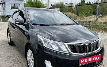 KIA Rio III рестайлинг, 2011 год, 3 фотография