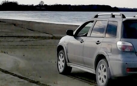 Mitsubishi Outlander III рестайлинг 3, 2005 год, 900 000 рублей, 4 фотография