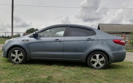 KIA Rio III рестайлинг, 2012 год, 3 фотография