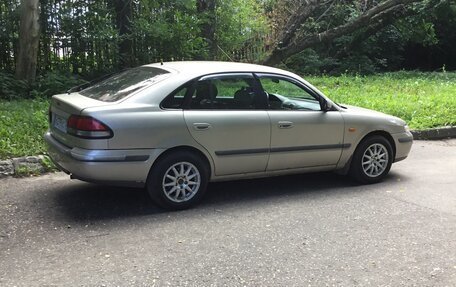 Mazda 626, 1999 год, 310 000 рублей, 4 фотография