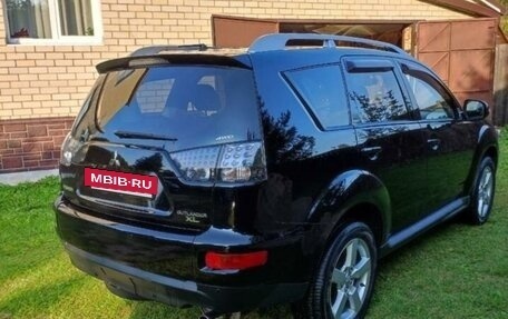 Mitsubishi Outlander III рестайлинг 3, 2010 год, 1 499 000 рублей, 4 фотография