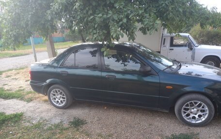 Mazda 323, 1998 год, 300 000 рублей, 1 фотография