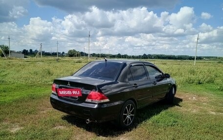 Mitsubishi Lancer IX, 2009 год, 630 000 рублей, 2 фотография