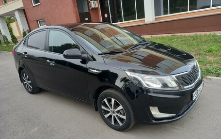 KIA Rio III рестайлинг, 2012 год, 748 000 рублей, 2 фотография