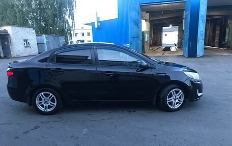 KIA Rio III рестайлинг, 2012 год, 915 000 рублей, 2 фотография