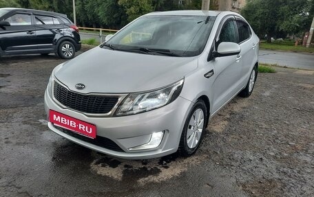 KIA Rio III рестайлинг, 2013 год, 910 000 рублей, 3 фотография