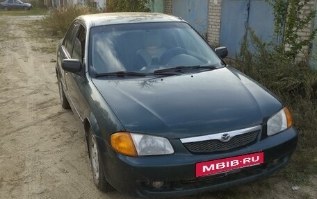 Mazda Protege, 1999 год, 215 000 рублей, 2 фотография