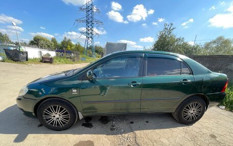 Toyota Corolla, 2004 год, 599 999 рублей, 5 фотография