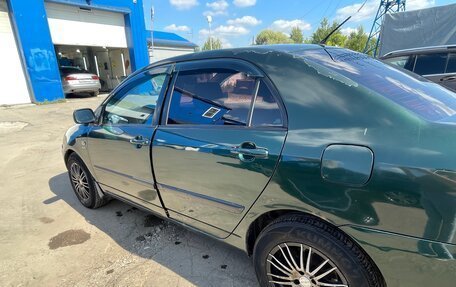 Toyota Corolla, 2004 год, 599 999 рублей, 9 фотография