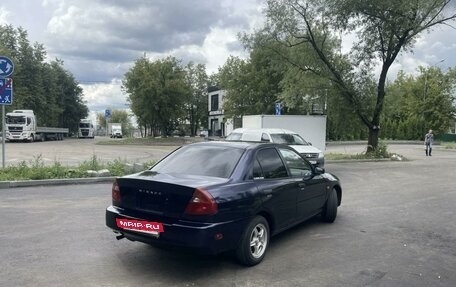 Mitsubishi Mirage VI рестайлинг, 1999 год, 4 фотография