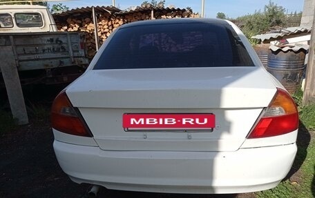 Mitsubishi Lancer VII, 1998 год, 220 000 рублей, 4 фотография