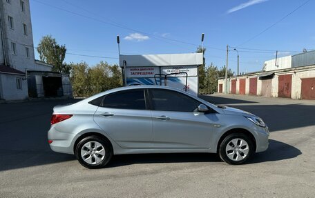 Hyundai Solaris II рестайлинг, 2011 год, 600 000 рублей, 14 фотография