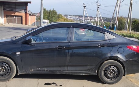 Hyundai Solaris II рестайлинг, 2011 год, 900 000 рублей, 4 фотография