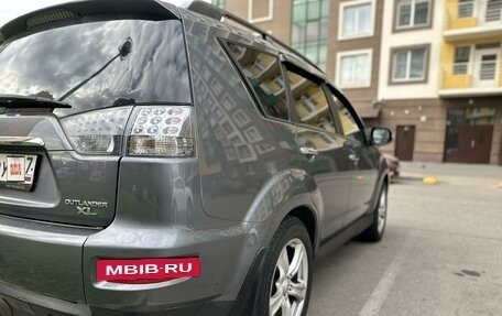 Mitsubishi Outlander III рестайлинг 3, 2011 год, 1 150 000 рублей, 10 фотография