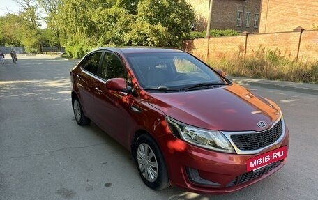 KIA Rio III рестайлинг, 2011 год, 690 000 рублей, 3 фотография