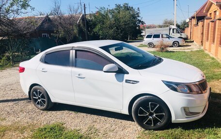 KIA Rio III рестайлинг, 2013 год, 890 000 рублей, 3 фотография