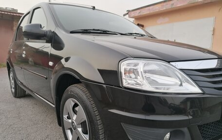 Renault Logan I, 2011 год, 859 000 рублей, 4 фотография