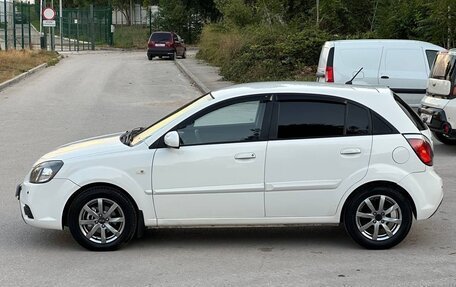 KIA Rio II, 2011 год, 897 000 рублей, 25 фотография